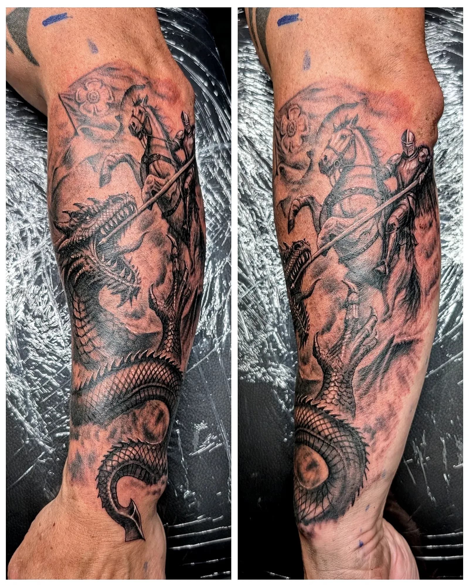 Black and grey realism tattoo of a knight on horseback spearing a coiled dragon, with a rose flag behind.