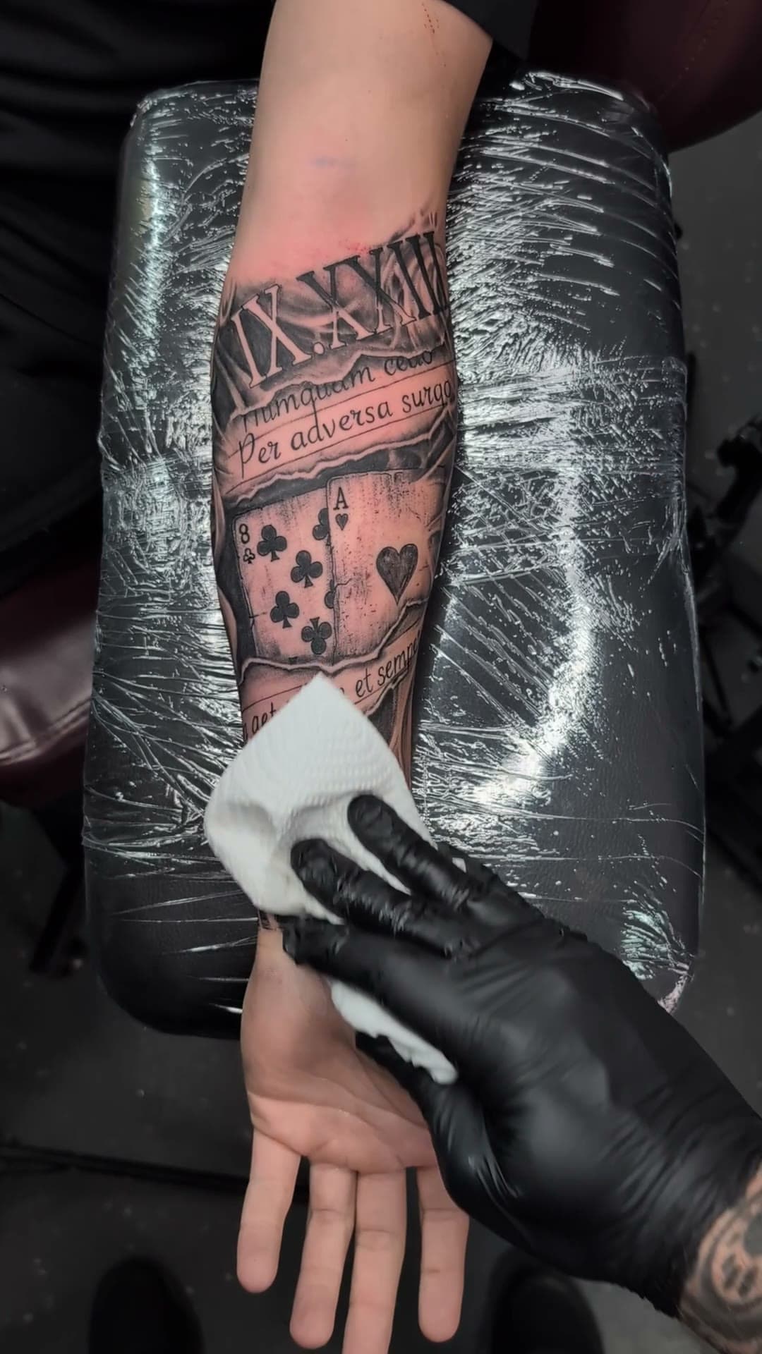 Playing card forearm tattoo, stencil to reveal